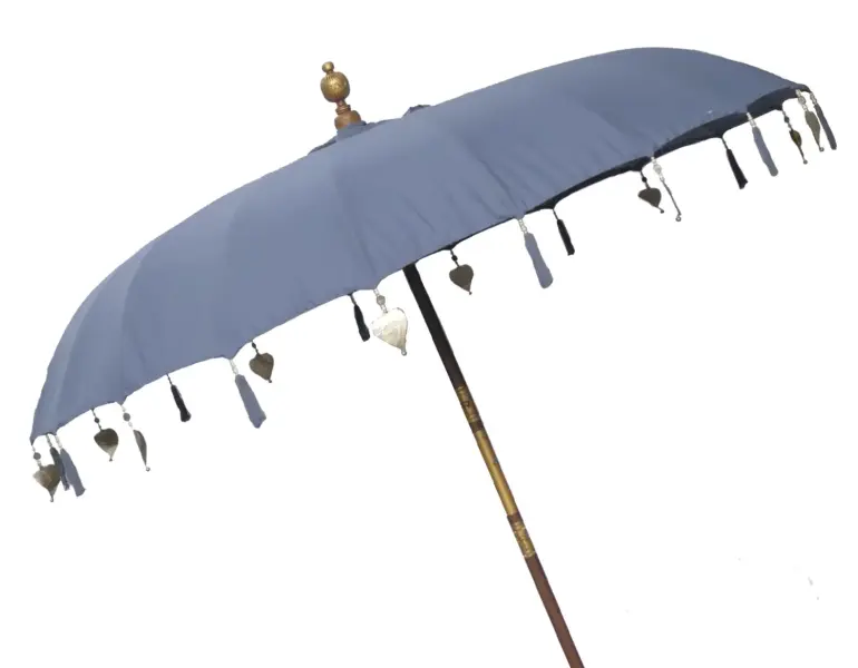 Product image of the product “Bali umbrella , dark grey 1 with wooden coins and gold leaves hanging around the edge. Approx. 230cm dia. and 250cm height ”